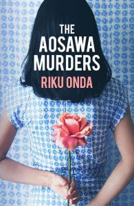 Book cover of the Aosawa Murders by Riku Onda, featuring a long-haired girl with her back-turned who is holding a pink flower